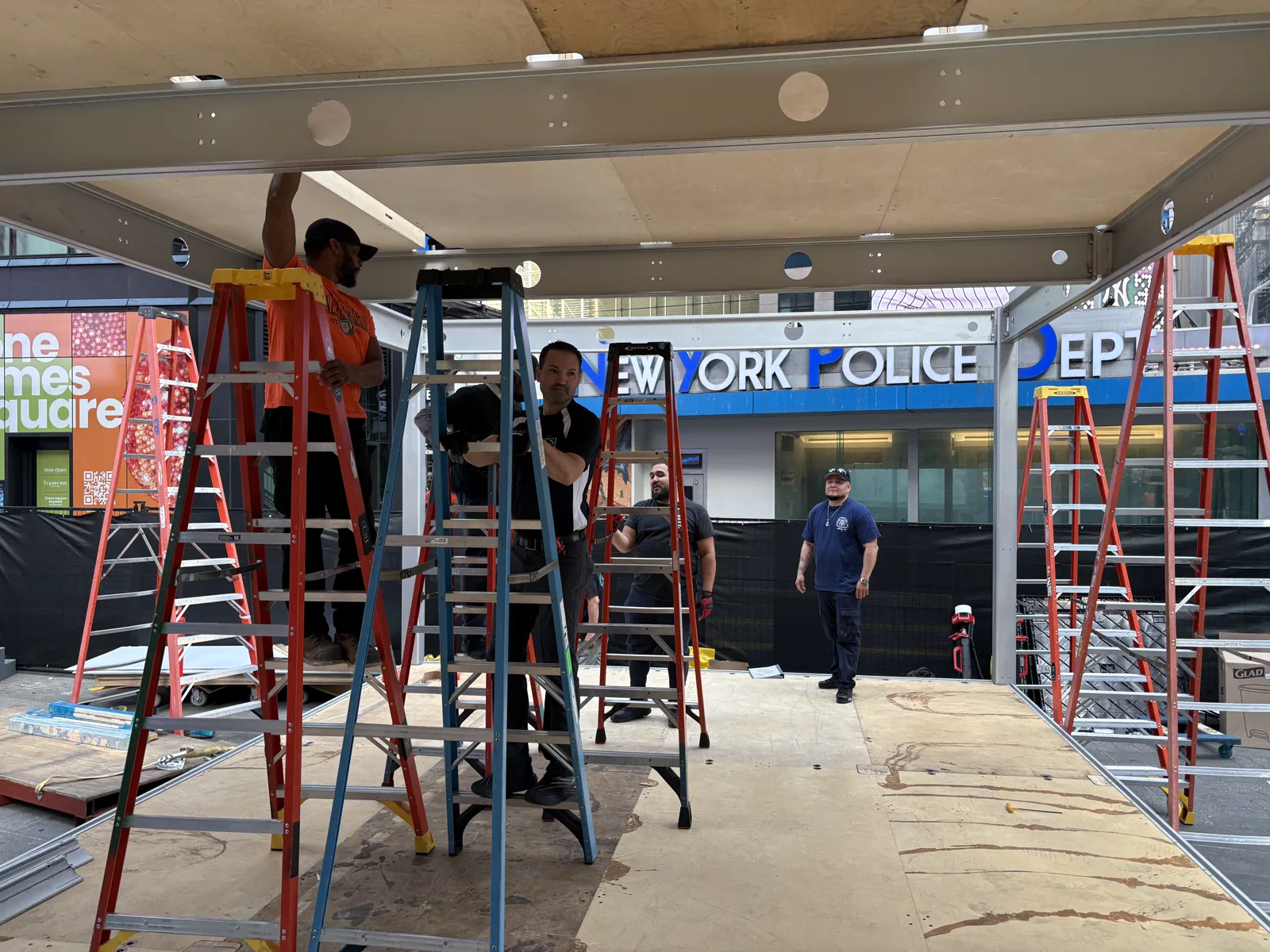 Crew working inside the activation structure during installation