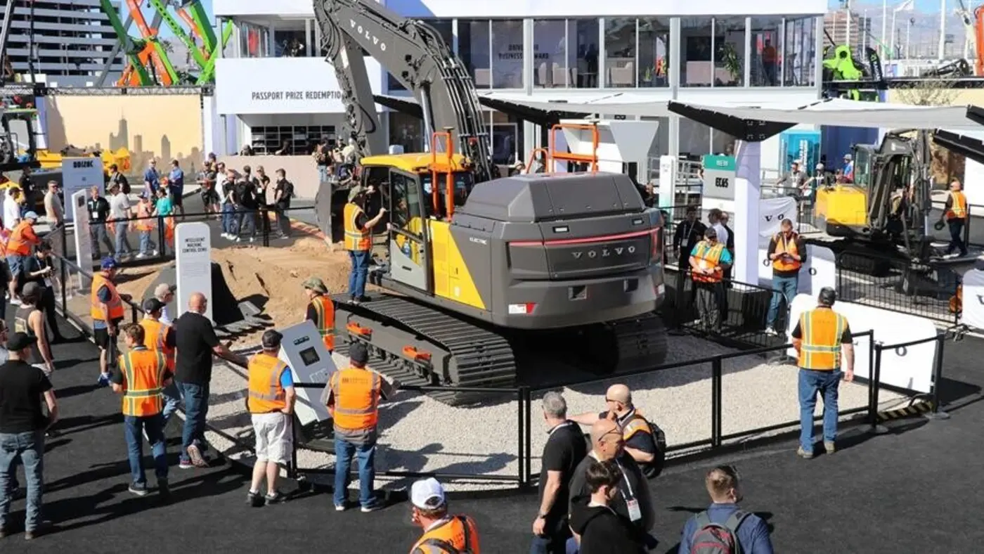 Guests viewing Volvo construction equipment inside the completed CONEXPO experience